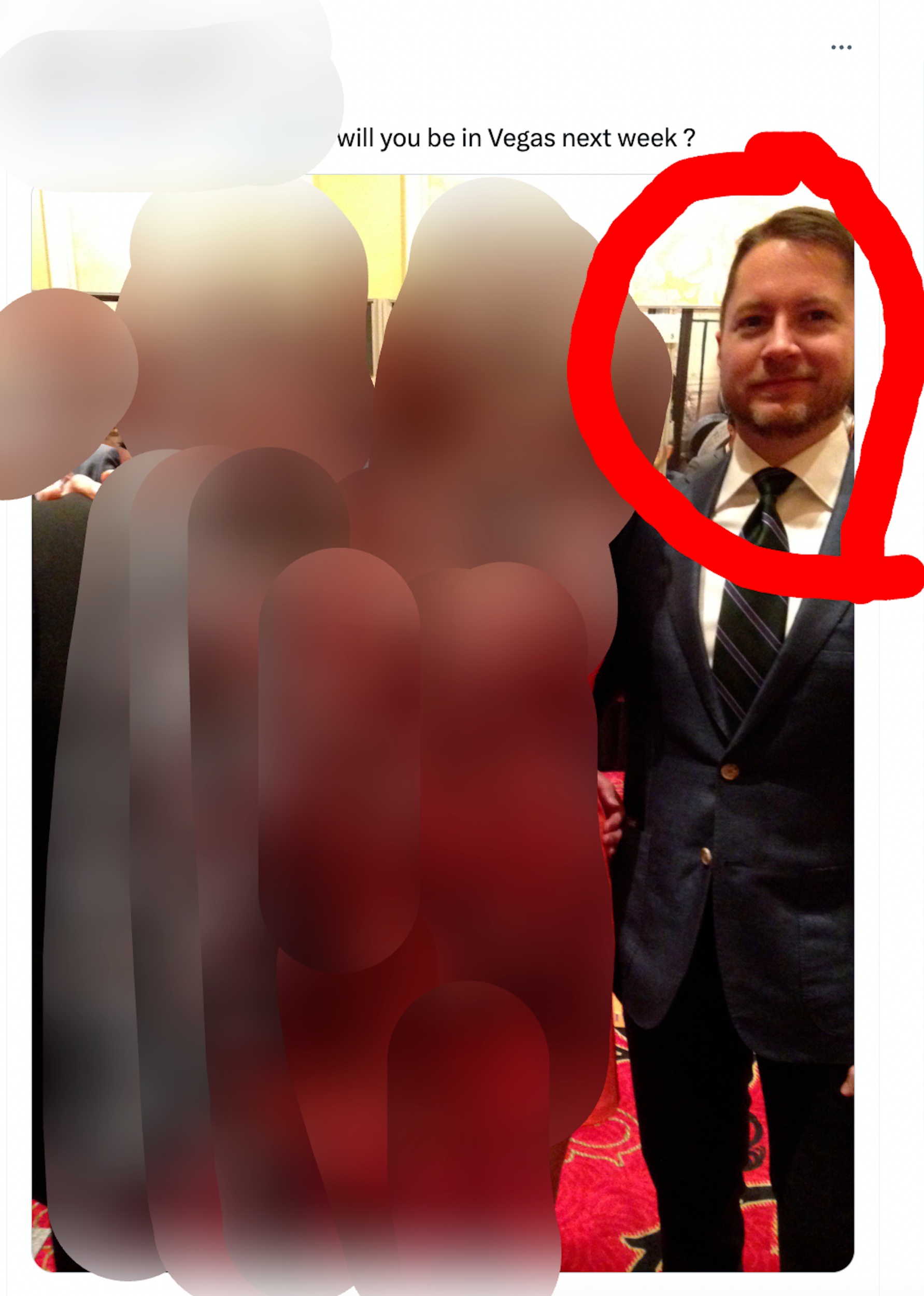 Blurred out pic of two people standing next to lightly bearded man in formal attire. Text above it reads, "will you be in Vegas next week?"