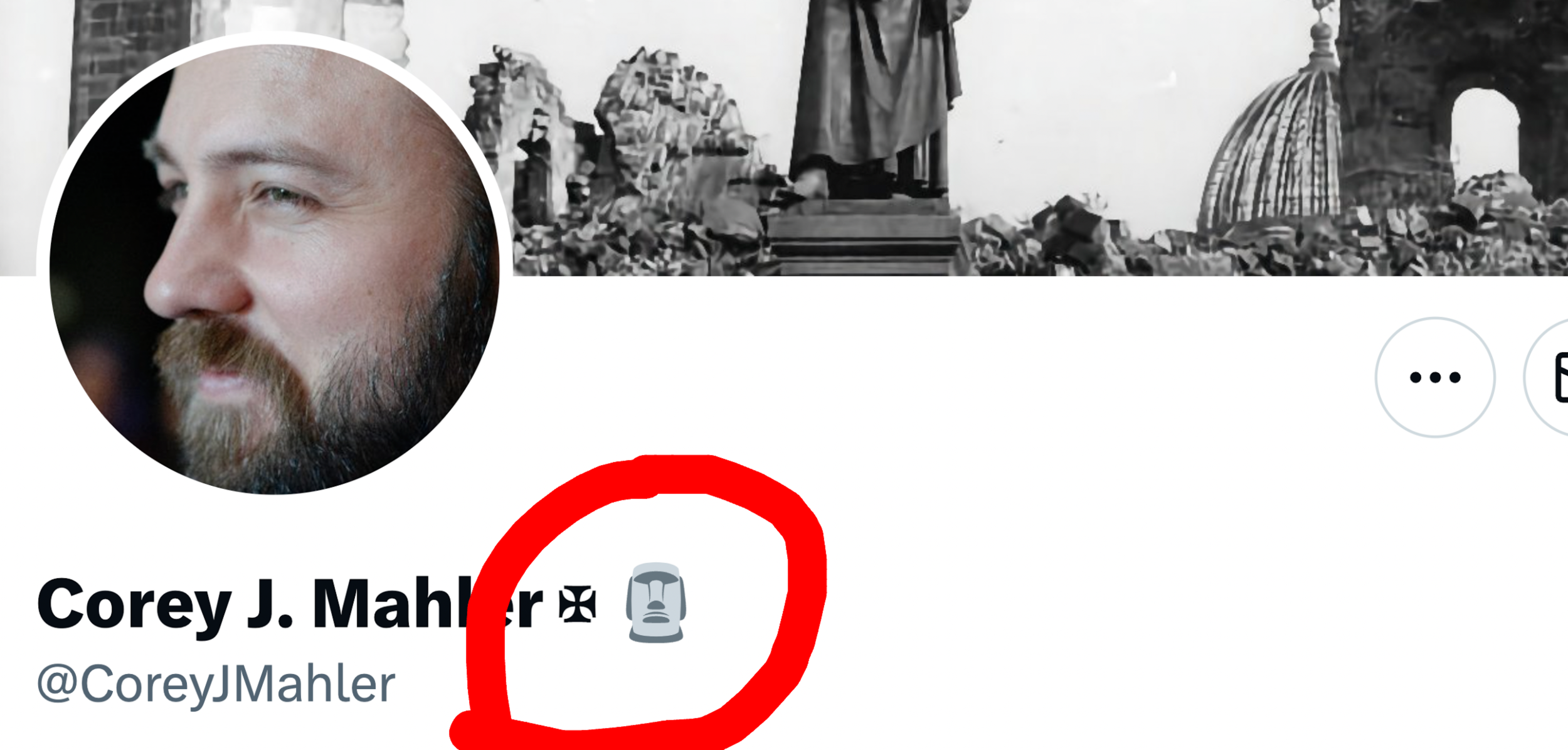 Closeup of Corey Mahler's twitter page, where you can see the SC "Easter Island" logo next to his use of the Iron Cross.
